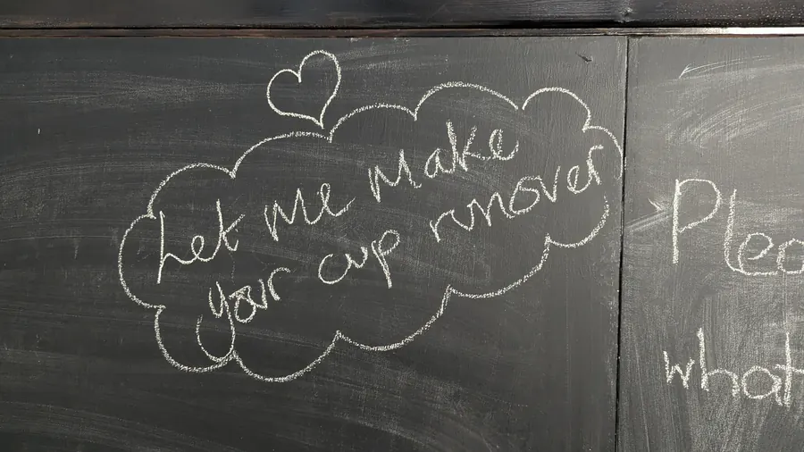 Chalk cloud and heart around the words Let me make your cup run over
